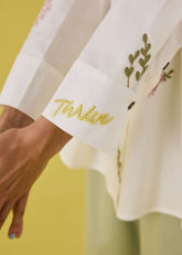 A Model Wearing White Organic Cotton Thrive Organic Cotton Shirt, curated by Only Ethikal